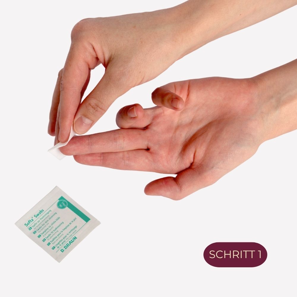 Schritt 1: Hand reinigt die Fingerkuppe mit einem Tupfer