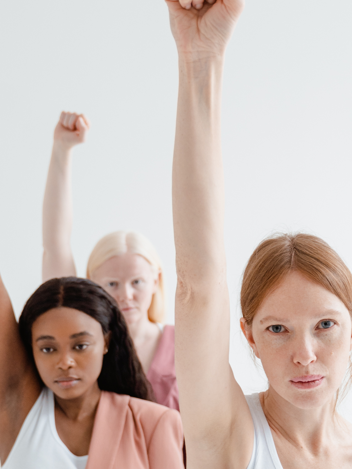 Confident women raising her arms, symbolizing reproductive autonomy and exploring financing options for egg freezing with Fyrce Care